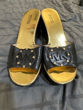 Michael Kors Black Leather Slide Mules with Gold Footbed and Stud Detail
